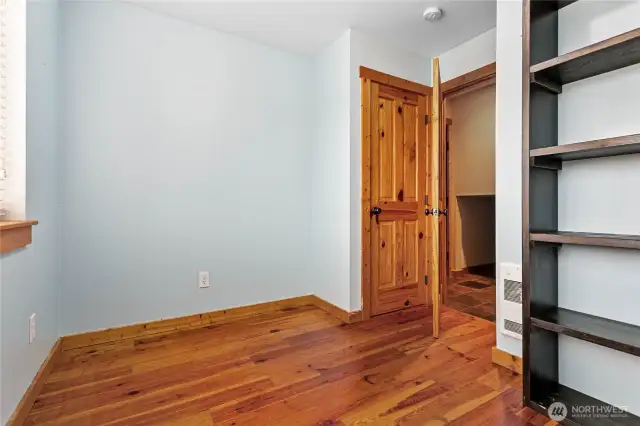 Smaller 4th bedroom on main floor, just off hall from garage entry