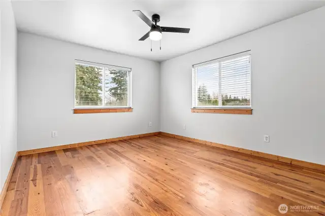 1 of 2 more large bedrooms upstairs, pine floors throughout most of home