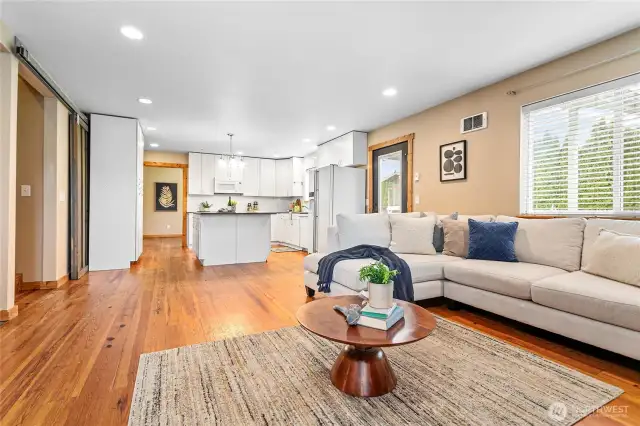 Nice open living area w/rustic pine floors throughout