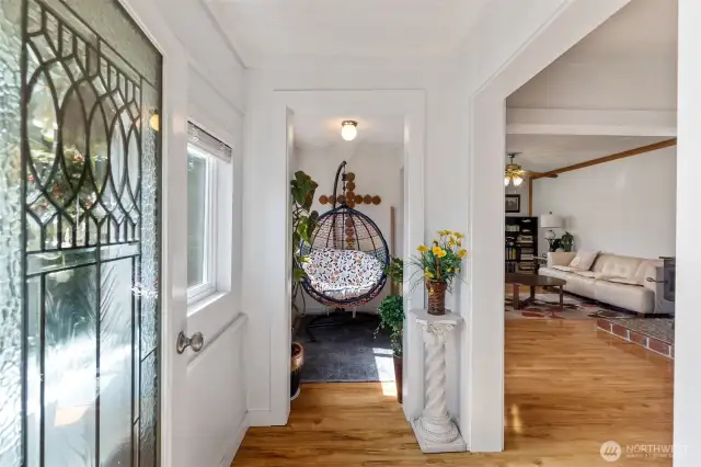 An attractive entry into the home. The living room is off to the right.