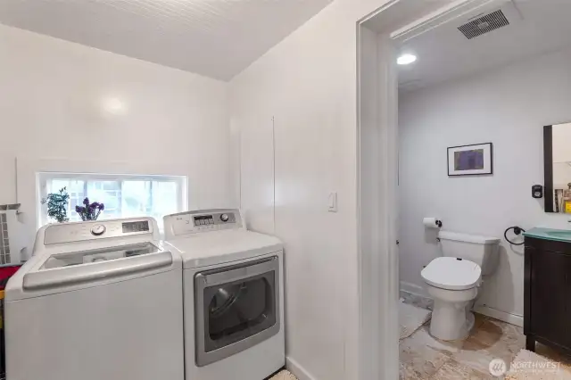 The laundry room and full bath on the main level.