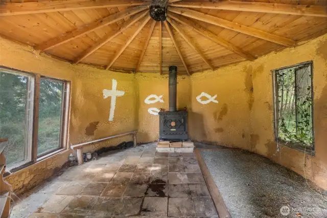 This is the unique mud hut that has been used as a sauna space. Hot Yoga maybe!