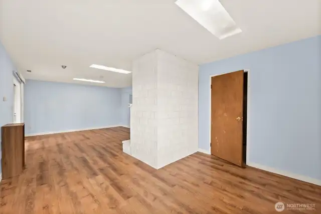 Around the corner of the great room is the Utility Room complete with Washer and Dryer as well as a half bath.