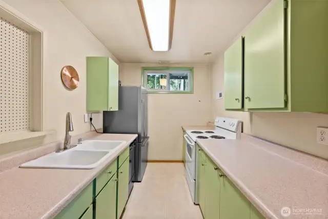 Just off the great room is a 2nd kitchen complete with Fridge and Range