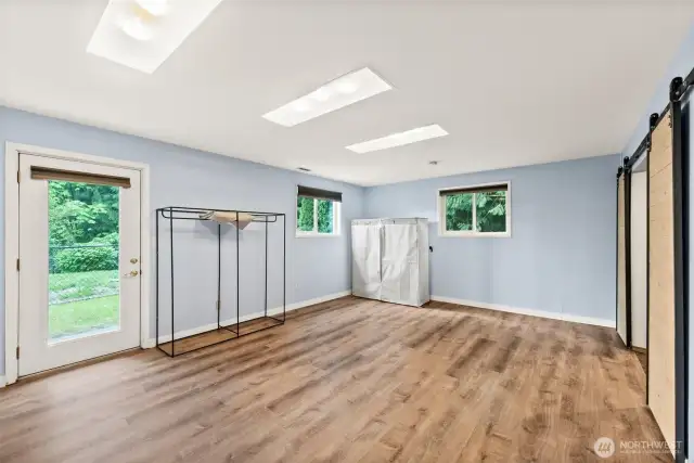 Lower Level 2nd Primary Bedroom includes ample walk closet and 4 Piece Ensuite Bathroom with 2nd walk in closet