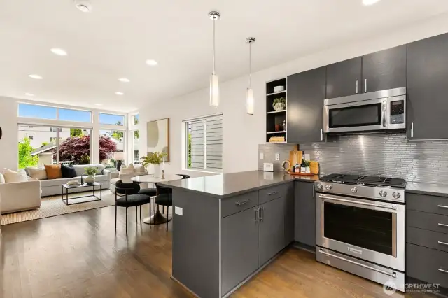 Head upstairs to the main level. Lots of natural light thanks to the walls of windows!