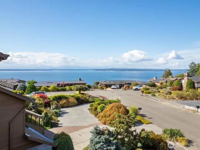 The Puget Sound and Cascade mountains decorate the horizon. Whether viewed from the deck, bedroom, or living room, the grandeur of the Pacific Northwest is on full display.