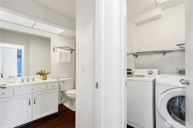Laundry room with side-by-side washer and dryer