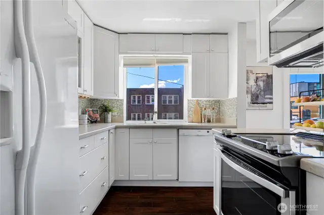 Fully updated kitchen with big window.