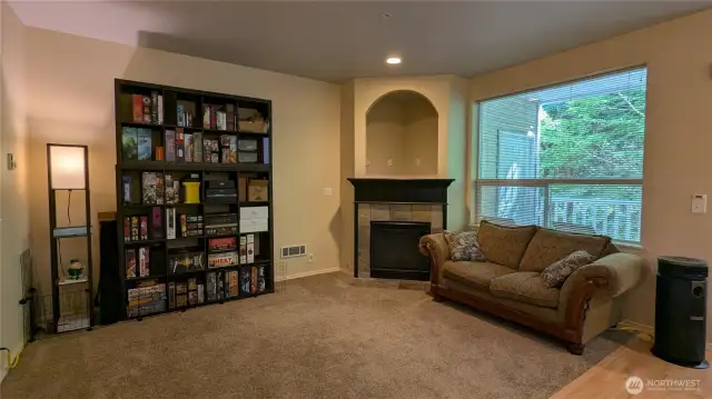 Living room overlooks greenbelt