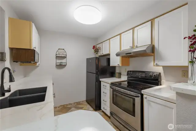 Updated counters, sink, cabinets