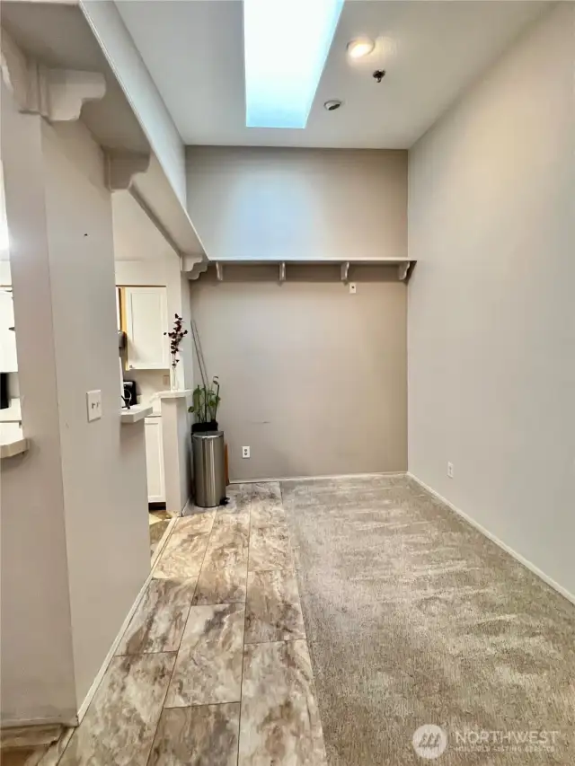 Dining area with Vaulted Ceiling and Skylight!