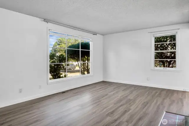 Shows large living room and lots of light.