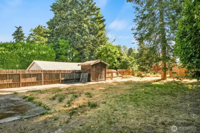 Back yard with storage shed, RV or boat parking and fenced.