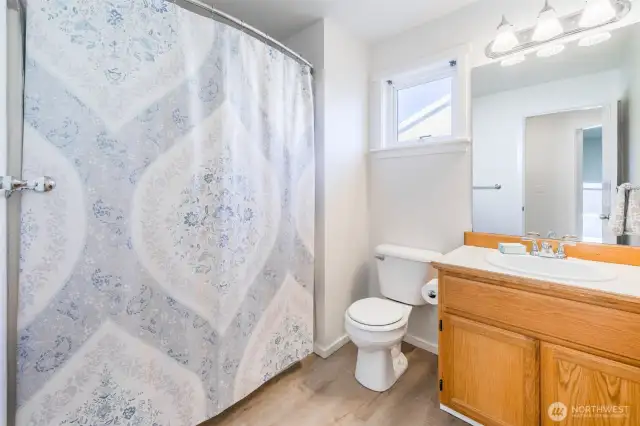 Upstairs bathroom with bedrooms
