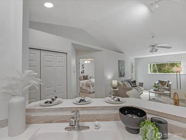 View of Living Area (Full Size Laundry behind double doors) from Kitchen