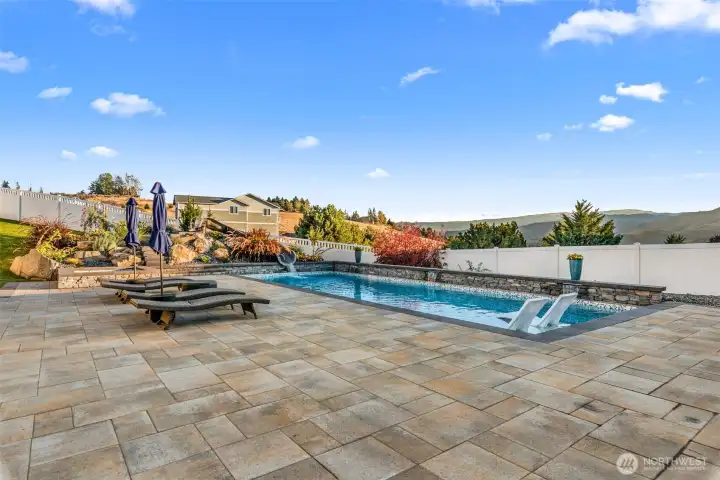 Designed for unforgettable summers, this outdoor oasis offers the perfect atmosphere for lounging, entertaining, and making memories.