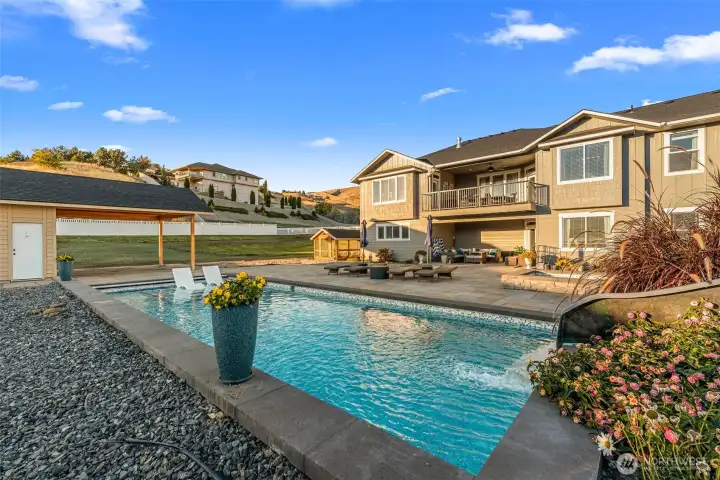 This resort-style backyard has everything you need for endless fun and relaxation