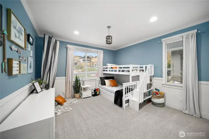 Bedroom 2 offers plenty of space, cheerful natural light and 2 walk-in closets.