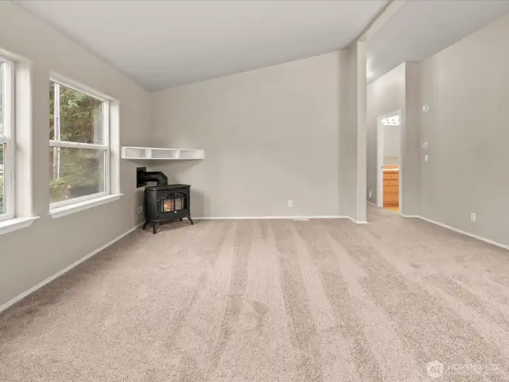 Visit with guests by the cozy gas stove