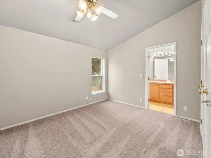 Primary bedroom includes a private bath