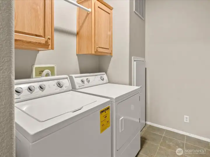Laundry room with washer and dryer included
