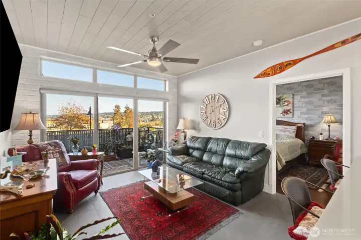 Spacious living room flows out onto the beautiful patio. Fully tiled throughout the living room, kitchen and entryway. Just some of the amenities this unit has waiting for you.