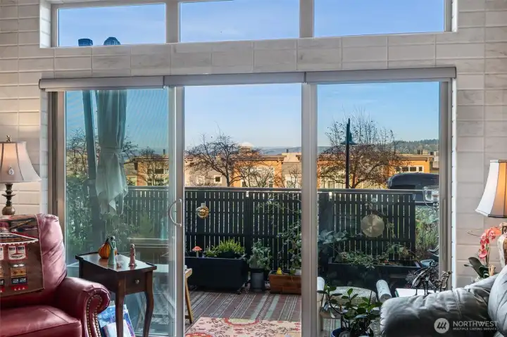 Spacious living room flows out onto the beautiful patio. Fully tiled throughout the living room, kitchen and entryway. Just some of the amenities this unit has waiting for you.