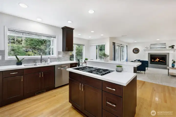 The well-appointed kitchen shines with modern finishes.