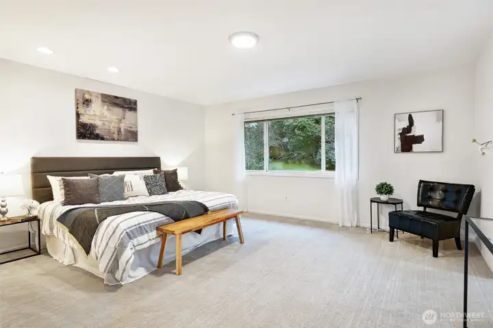 Upstairs, your spacious primary suite awaits you.