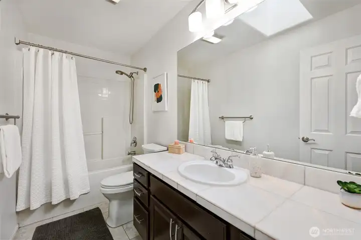 Full bath off the upper hallway.