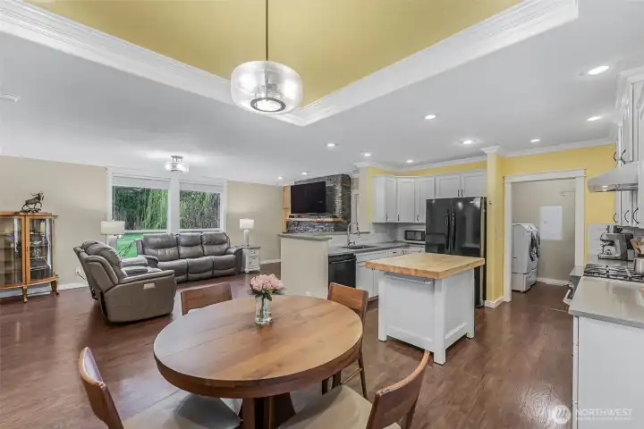 Laundry/mud room is behind the kitchen leading to back entrance