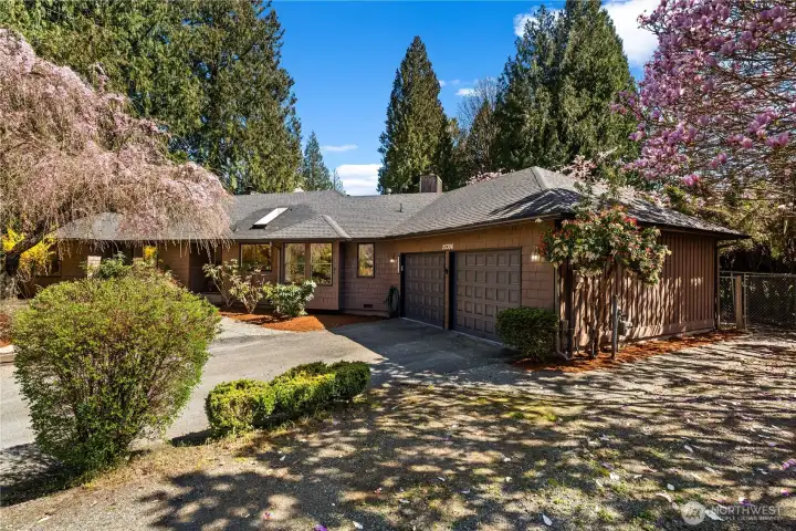 Discover comfort, space, and privacy in this beautifully maintained three-bedroom home, ideally located in the desirable Cedar Downs community, surrounded by mature trees