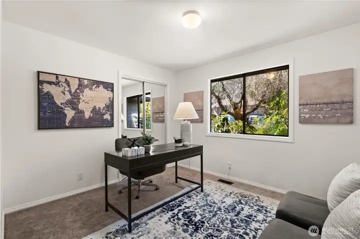 New mirrored closet doors are featured in the secondary bedrooms.  They beautifully reflect the landscape outside and add natural light to the rooms.