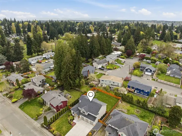Drone over-view of neighboring area and home