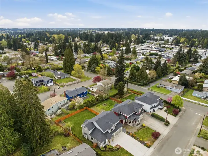 Drone over-view of neighboring area and home