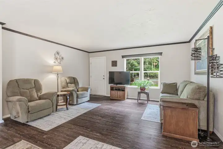 Spacious living area with natural light.