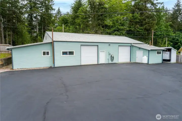 Detached rec room, commercial kitchen and smoker room