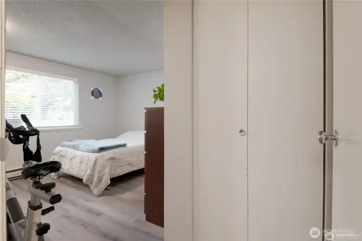 Roomy primary suite with extra storage space for convenience and organization.
