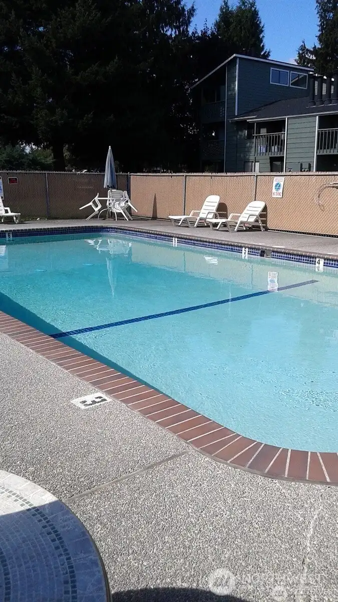 Enjoy relaxing days at the community pool, just steps from home.