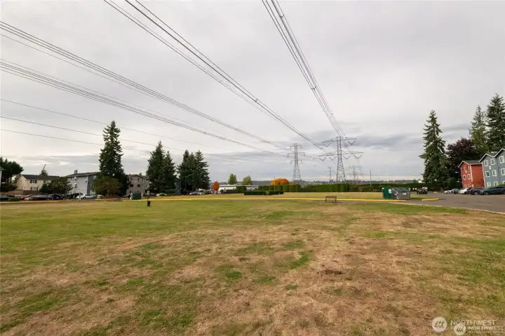 Expansive field offering room exercise and explore. The community enjoys two different Dog Parks for our furry friends.