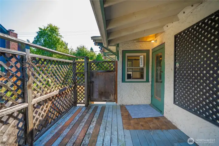 From the kitchen you get this side porch.