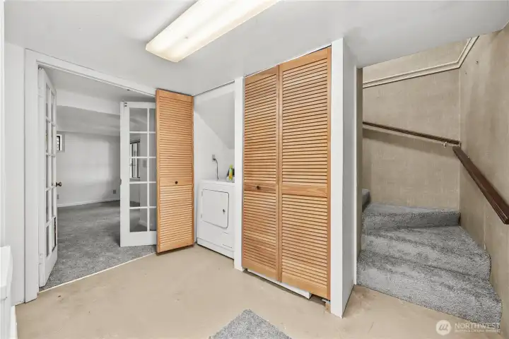 Down here you'll find the laundry and 2 bedrooms