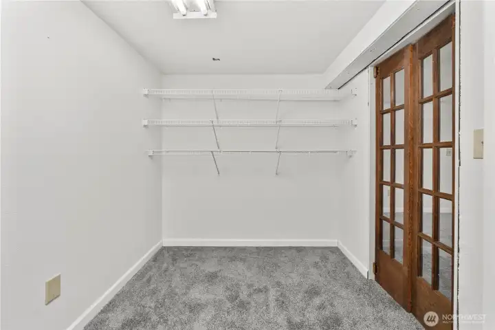 This room is at the end of the hall and features its own walk in closet