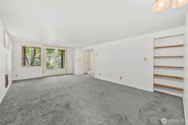 It's big enough for all that, opens up to the back yard on one side and has a walk in closet on the other side