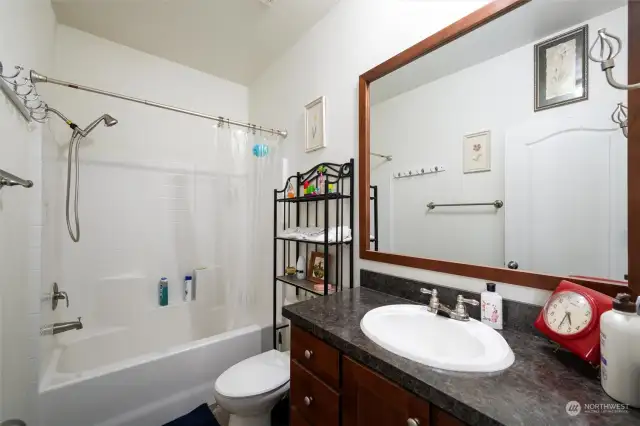 Full bathroom off hallway.