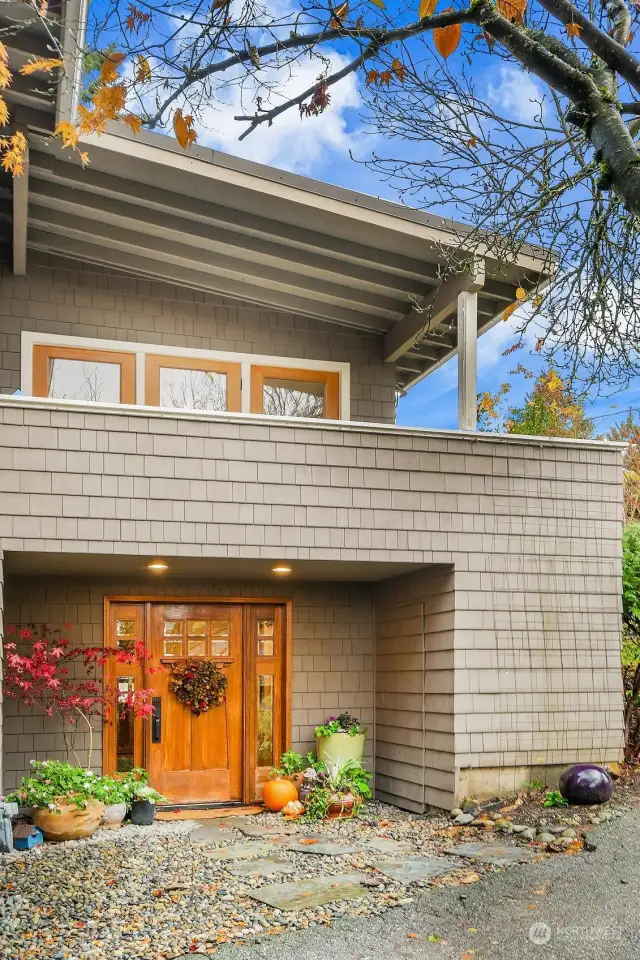 Front entry with a secondary deck off dining area