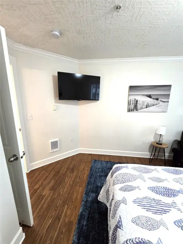 bedroom one wall mounted tv