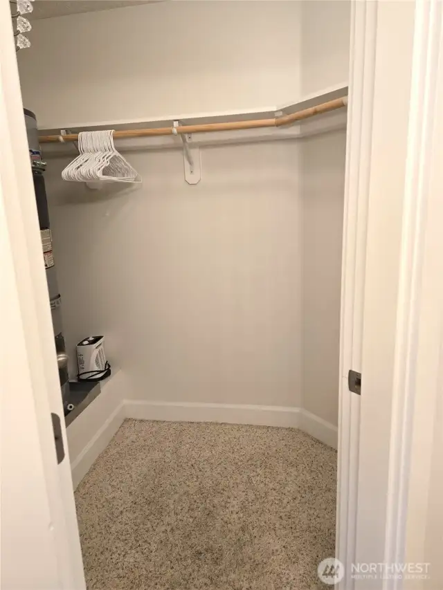 water heater is located in primary bathroom