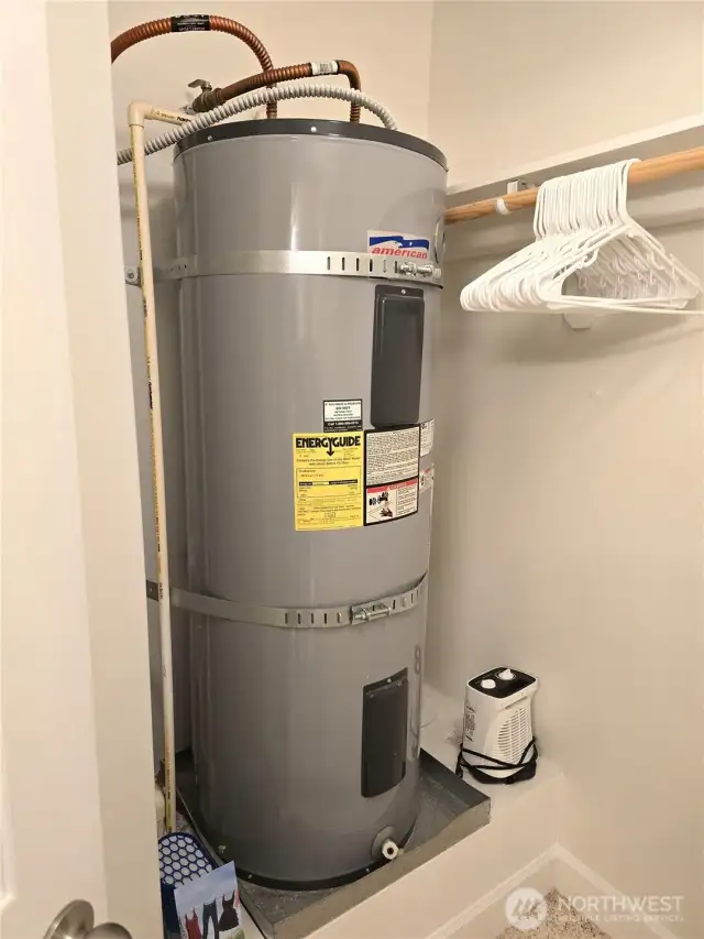 water heater is located in primary bathroom